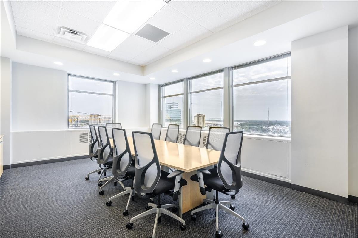Professional conference room at 841 Prudential Drive, 12th Floor with large windows.