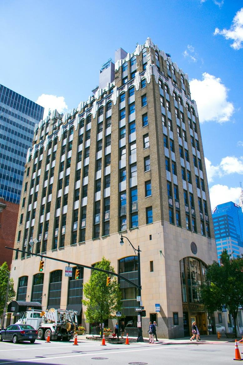 Exterior view of the historic brick and stone building at 85 E. Gay St, Columbus (OH).
