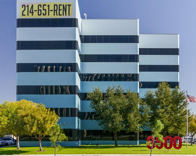 Exterior of the blue and white striped building at 8500 N Stemmons Fwy.