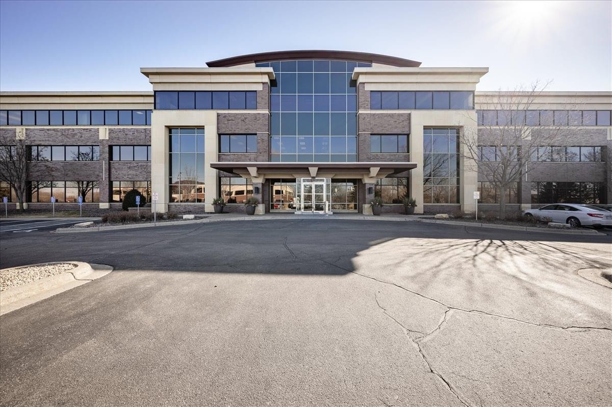 Exterior view of the multi-story professional building at 860 Blue Gentian Road, Suite 200.