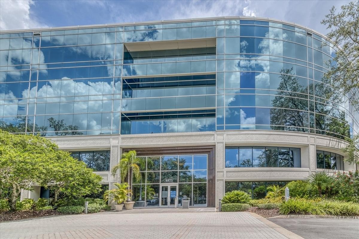 Exterior view of the glass-facade Lake View Building, Hidden River Center.