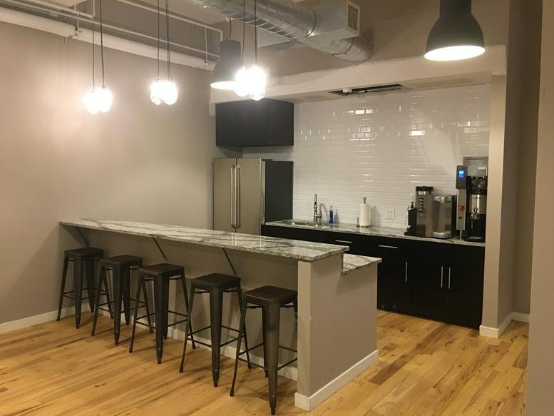 Spacious communal kitchen and breakout area at 90 Broad Street, 2nd & 3rd floor.