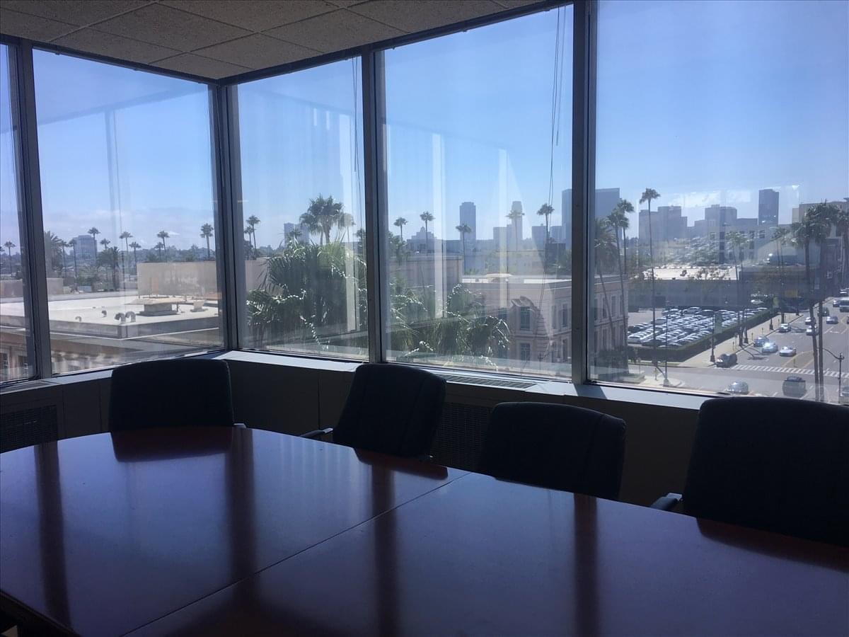 Boardroom at 9107 Wilshire blvd, Suite 450, showing a polished table and expansive city views.