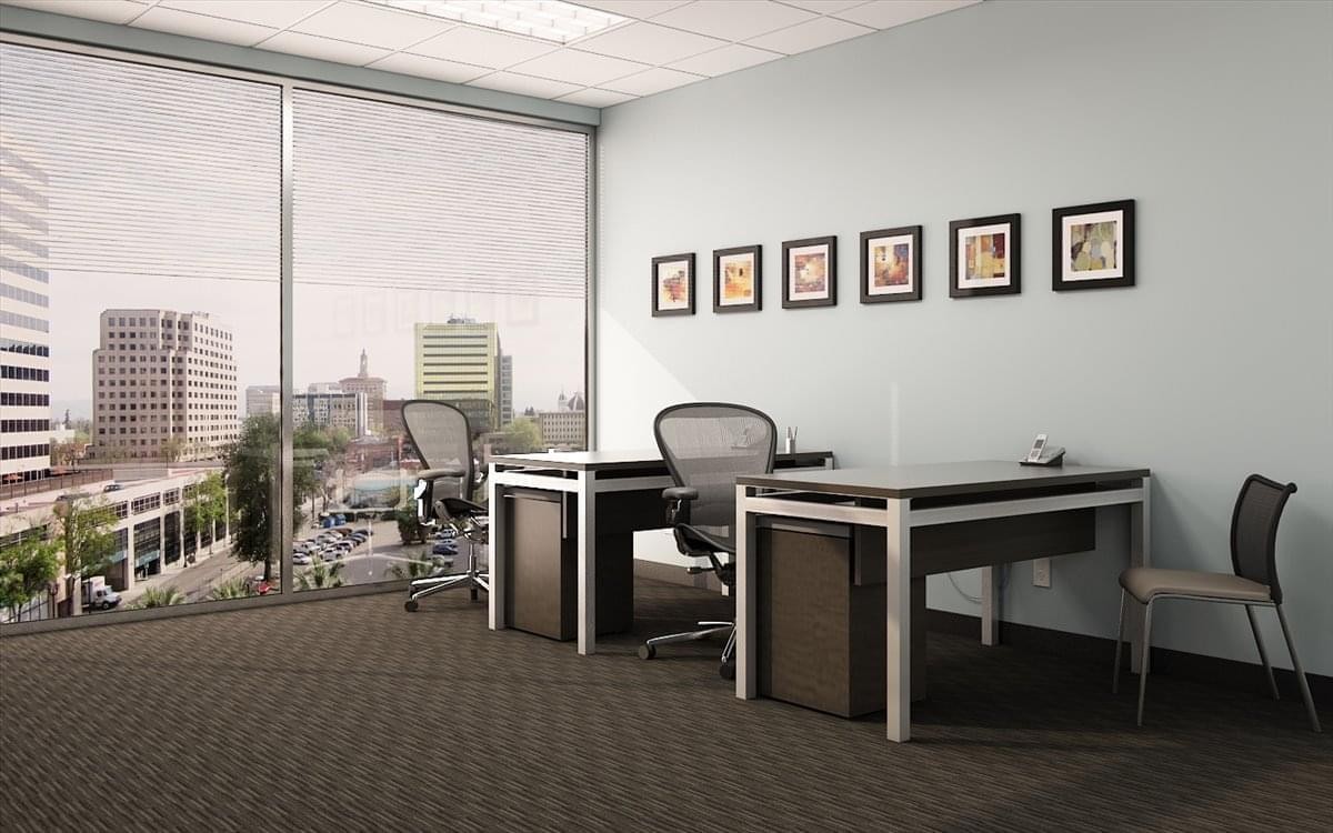 Spacious two-person office suite at 9160 Forum Corporate Parkway, Suite 350 with large city-view windows.
