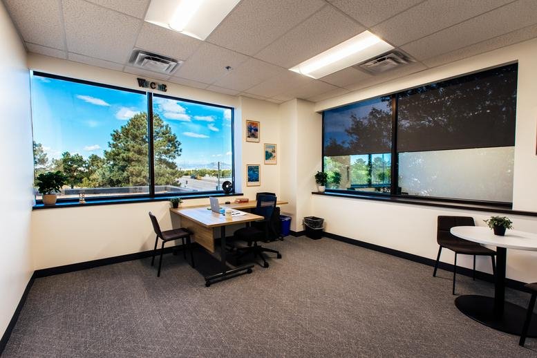 Spacious private office at 9191 Sheridan Blvd, City Center, Westminster, Colorado with large corner windows.