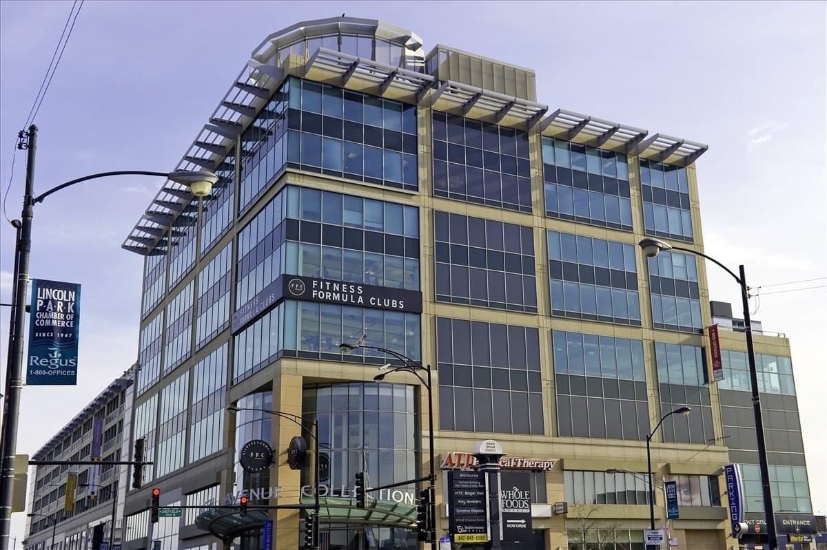 Exterior facade of the contemporary mixed-use building at 939 W. North Avenue, Suite 750.