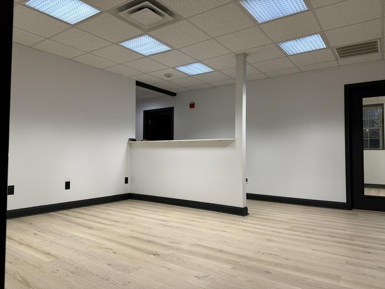 Reception area at 960 Reservoir Avenue, Unit 27, Cranston, Rhode Island featuring a sleek white counter.