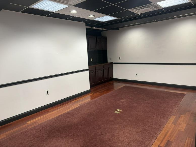 Executive office at 960 Reservoir Avenue, Unit 27, Cranston, Rhode Island with dark wood accents.