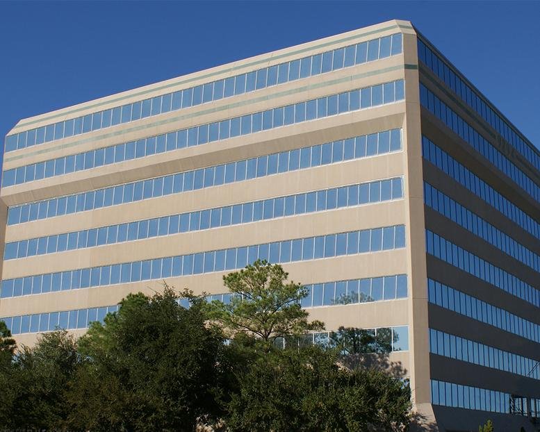 Exterior view of the multi-story professional office building at 9894 Bissonnet.