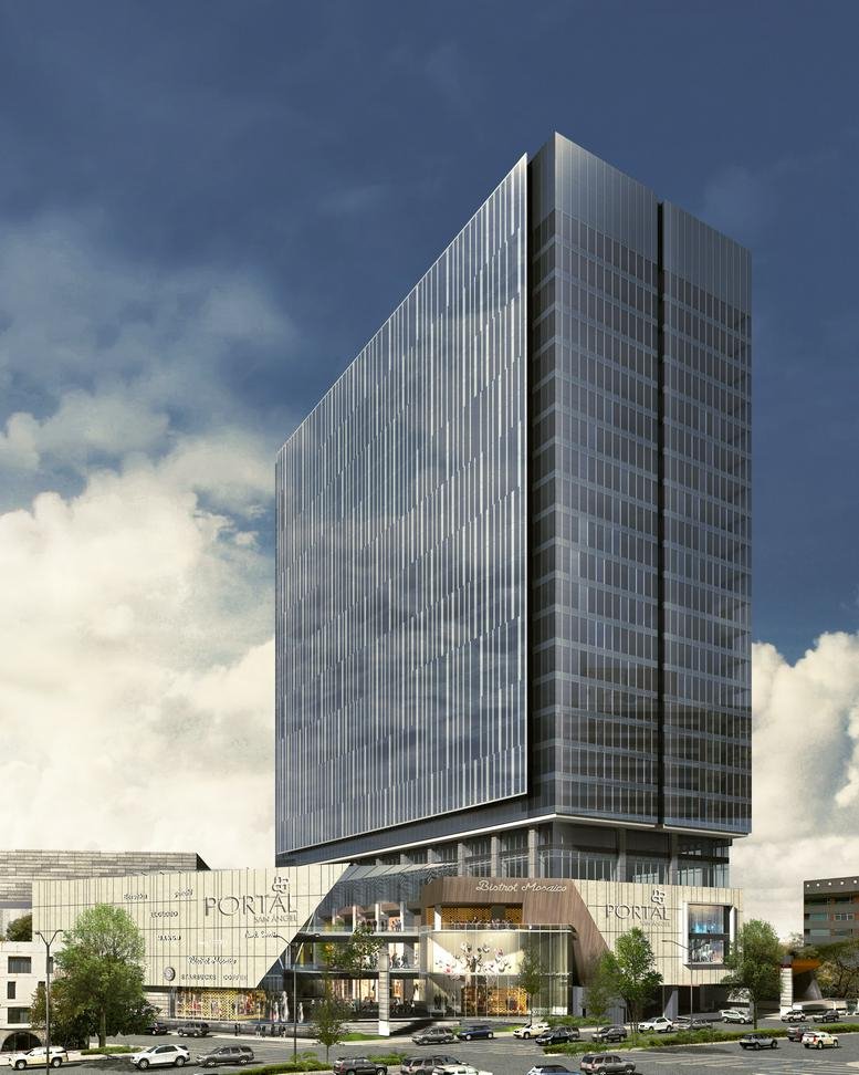 Exterior view of the glass-facade Portal San Angel building against a cloudy sky.