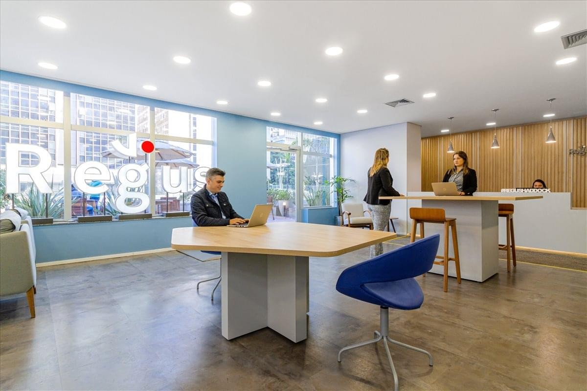 Bright reception area at Avenida Paulista 2. 300, andar Pilotis, Sao Paulo, Brazil with wooden accents.