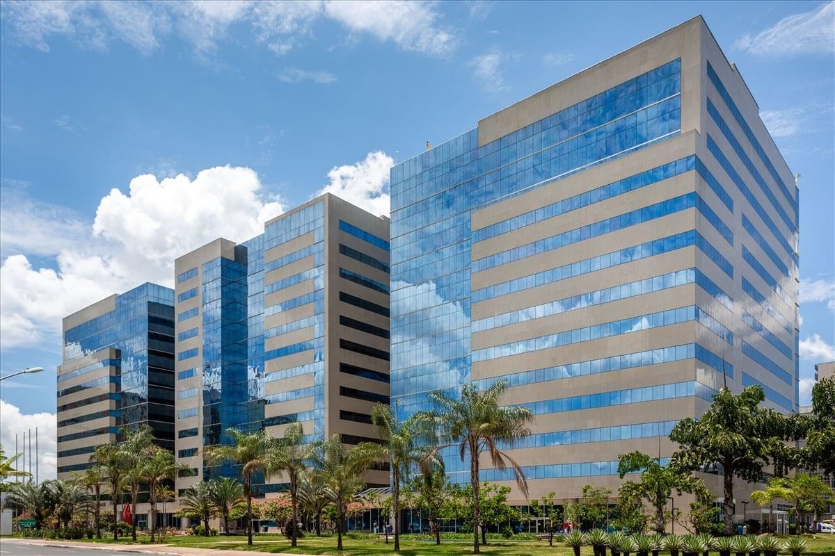 Exterior view of the modern glass-facade Centro Empresarial Parque Cidade Corporate buildings.