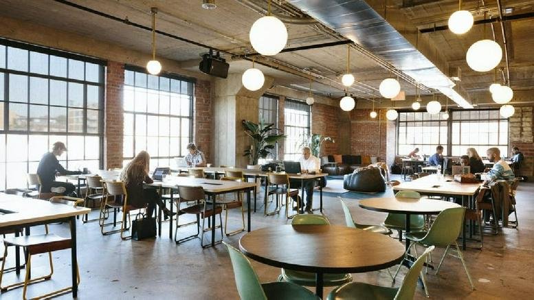 Spacious communal coworking area at Corrigan Station, 1828 Walnut Street, Kansas City (KS).
