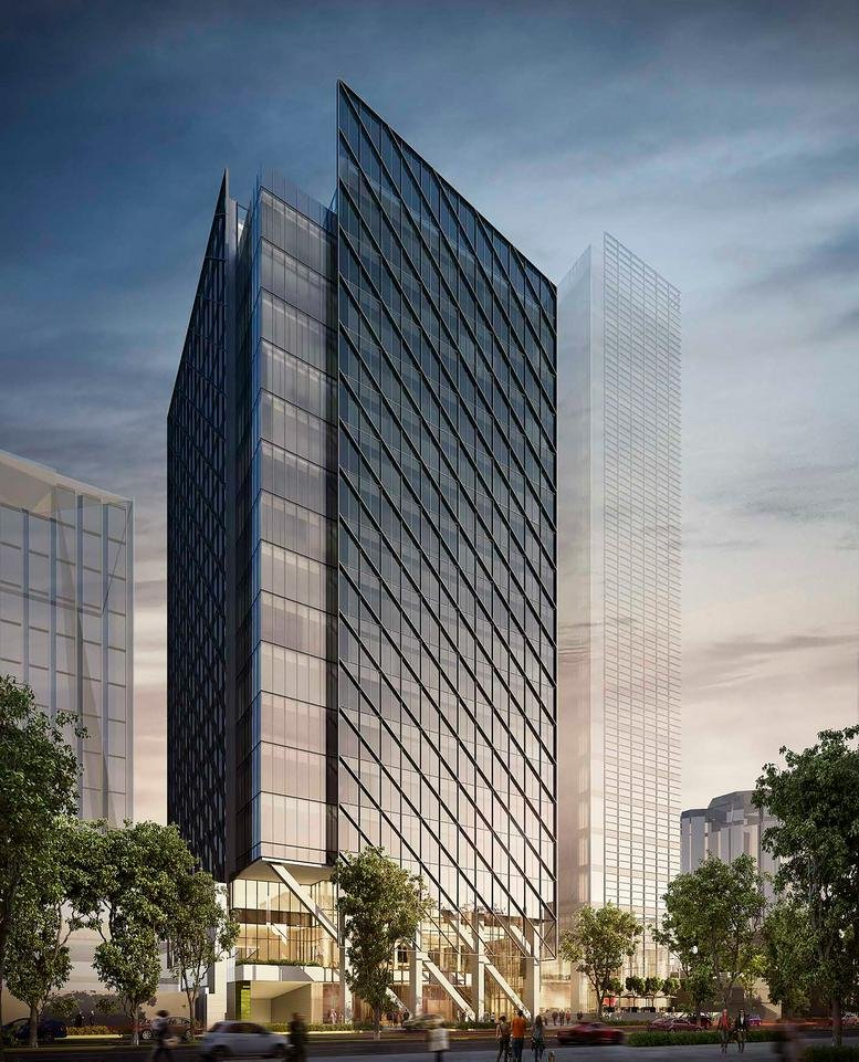Modern glass exterior of the Insurgentes Sur 1431 office building against a twilight sky.