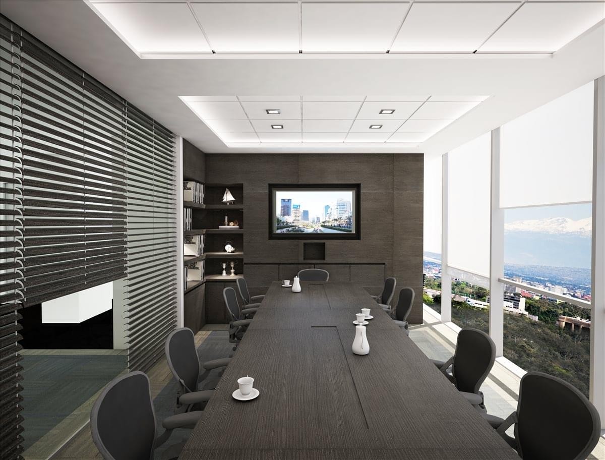 Professional boardroom with a dark wood table and large windows with city views.