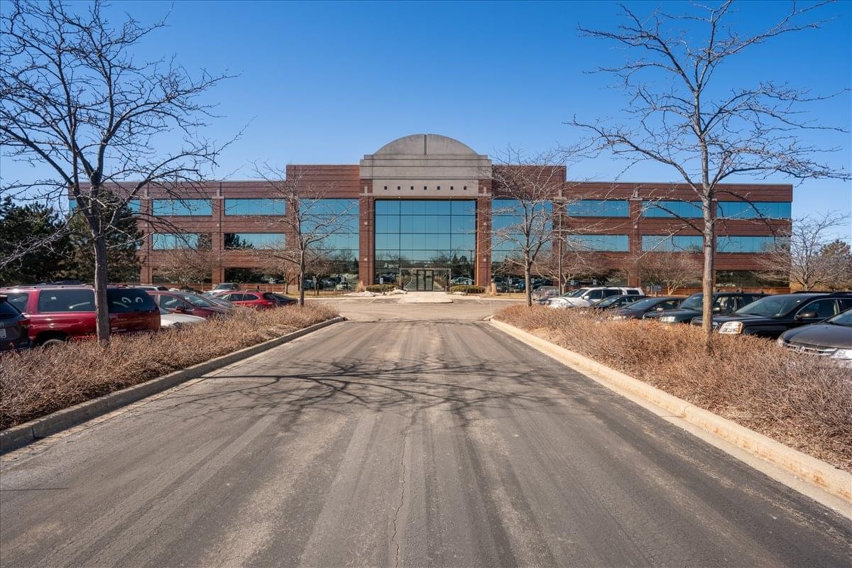 Exterior view of the brick and glass building at N19 W24400 Riverwood Drive.