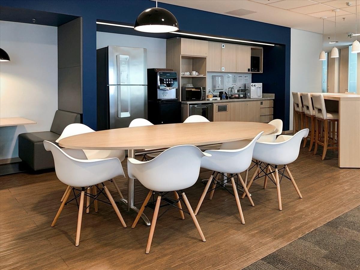Bright communal kitchen and dining space at Nacoes Unidas Tower, 12495, Nacoes Unidas Avenue.