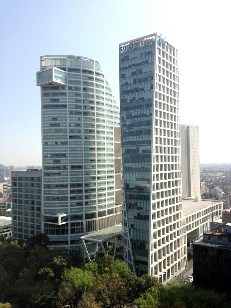 Exterior view of the modern glass skyscrapers at Tower 1, Paseo de la Reforma 222.