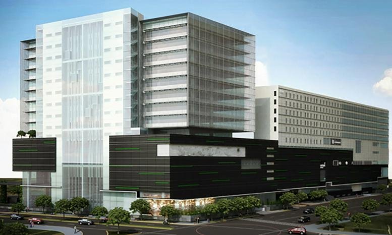 Exterior view of the modern Metropoli Patriotismo building with tiered glass and black facade.