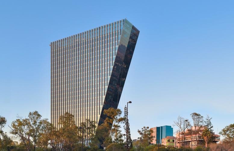 Modern glass exterior of the angular Pedregal 24, Lomas de Chapultepec building.