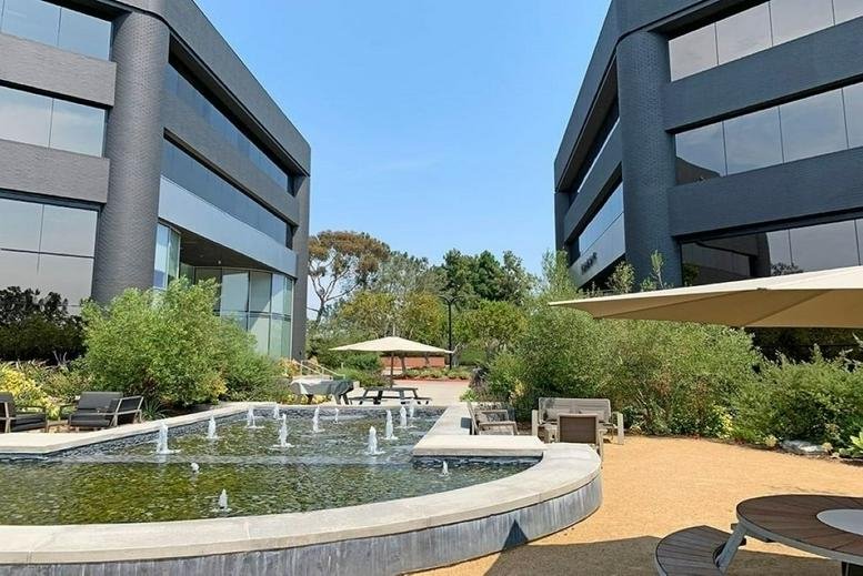 Exterior courtyard and fountain at Plaza Del Mar on 12636 High Bluff Drive.