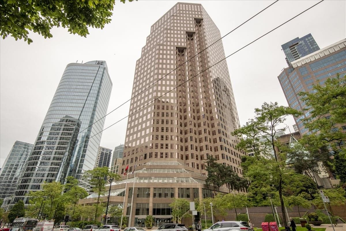 Exterior view of the towering brown stone facade of Park Place at 666 Burrard Street.