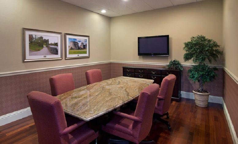Spacious boardroom at The Business & Law Building, 27911 Crown Lake Boulevard, Suite 200, Bonita Springs.