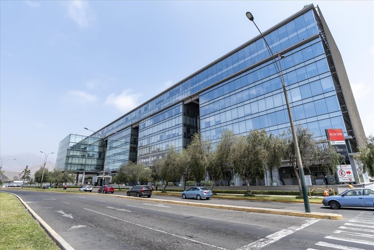 Exterior view of the glass-facade Tower I at Av. El Polo.