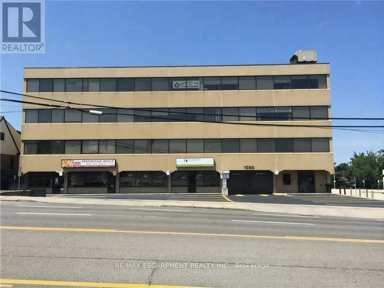 Exterior view of the multi-story commercial building at 1030 Upper James Street.