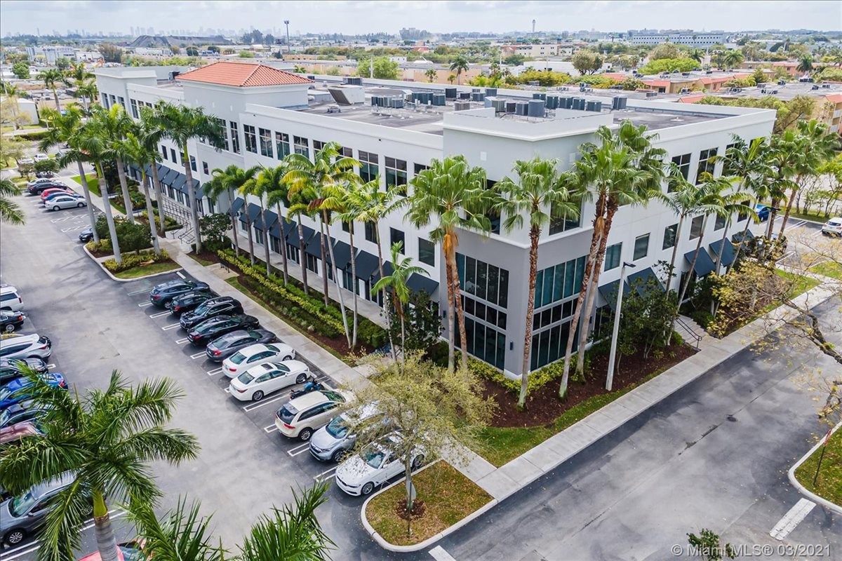 Exterior view of the white professional building at 7950 NW 53rd Street.