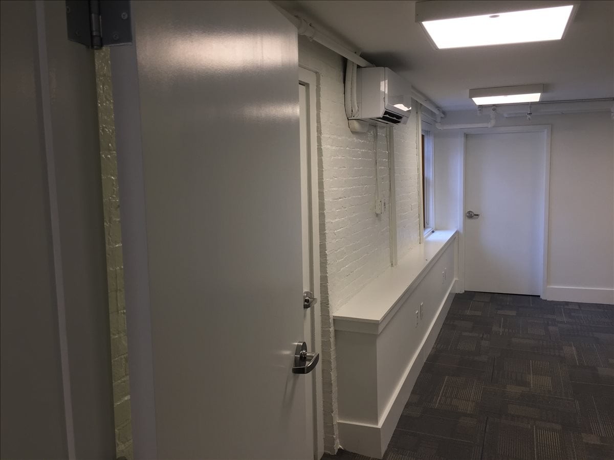 Entrance to a private office suite at 99 Bishop Allen Drive.