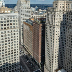 Elevated view of the surrounding urban skyline and architectural landmarks from a high floor.