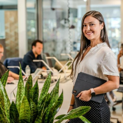 Relaxation space featuring a massage chair and colorful accent lighting.