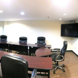 Large seminar room with modular tables and whiteboard at 10015 Old Columbia Rd, Suite B215, Columbia.