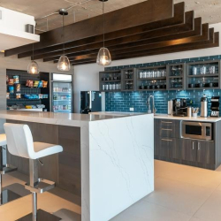 Modern office kitchenette with breakfast bar and blue tiling, Avenida Juan Ponce de León, San Juan