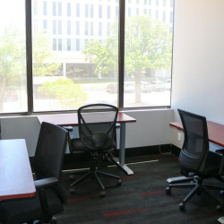 Private office suite with desk, mesh chair, and guest seating, 1903 Central Drive, Bedford, Texas.