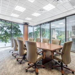 Professional boardroom with large wooden table and glass partitions, Clairemont Avenue Business Centre, Decatur, Atlanta