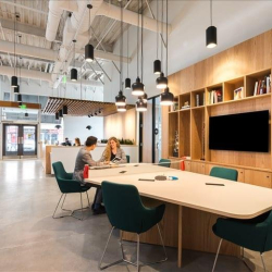 Professional meeting area with wooden shelving and media screen, Traverse Ridge Center III, Lehi, Utah