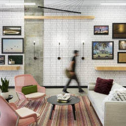 Stylish lounge area with gallery wall and modern furniture, Traverse Ridge Center III, Lehi, Utah