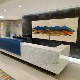 Exterior view of 144 4th Avenue SW, Suite 2100. Click for details.