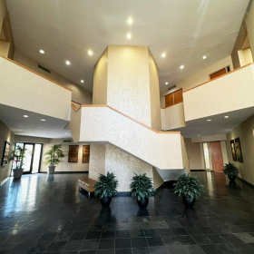 4241 Woodcock Dr executive office centres. Click for details.