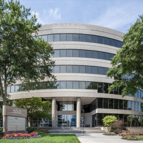 Modern multi-story curved office building facade, Clairemont Avenue Business Centre, Decatur, Atlanta. Click for details.