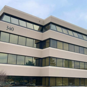 Exterior view of the multi-story glass building at 340 West Butterfield Road.. Click for details.