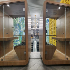Private wooden call booths with glass doors at Metro Hub Cowork, Via Espana, Panama.. Click for details.